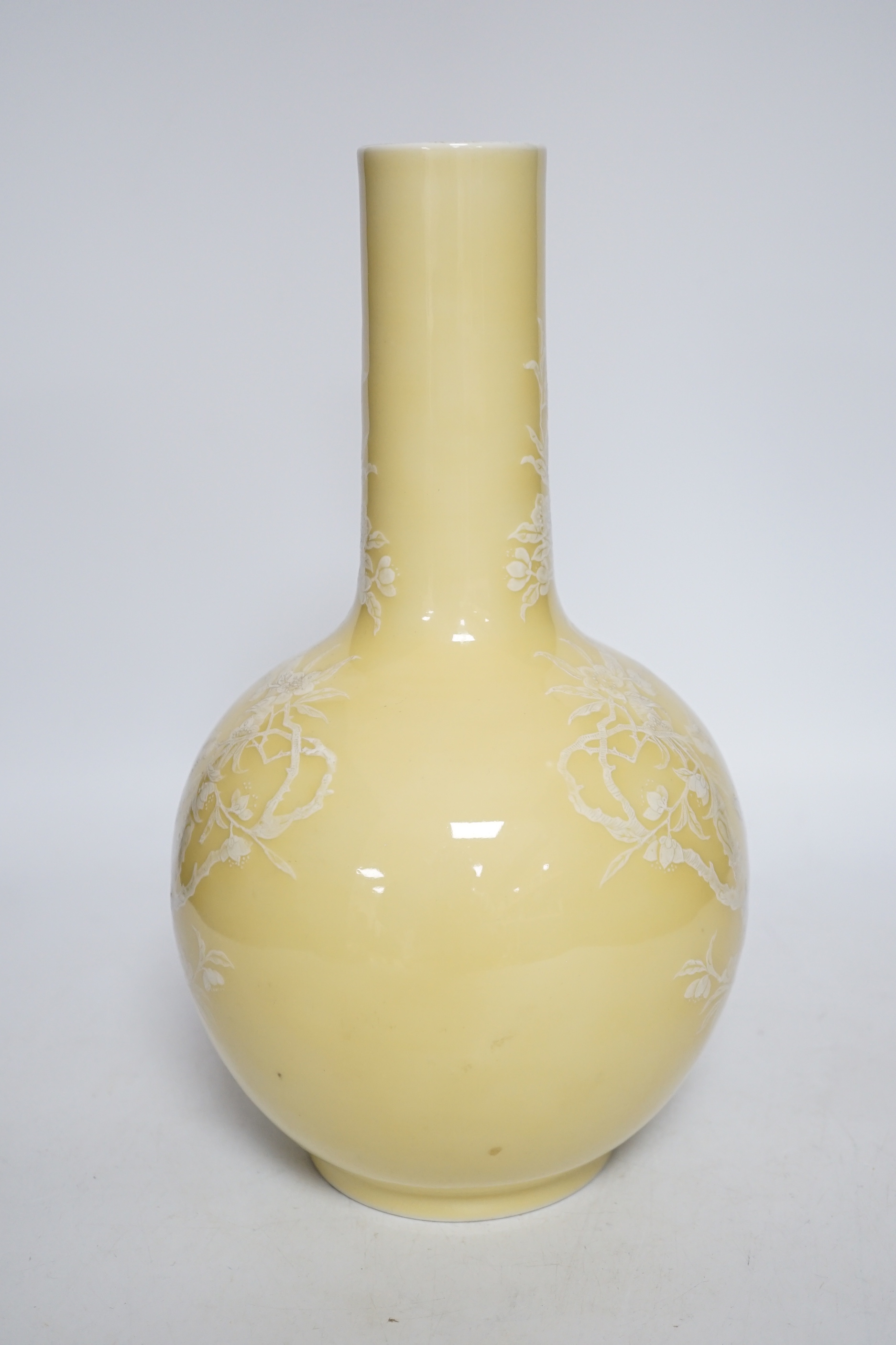 A Chinese yellow glazed bottle vase, drill hole to base, 29cm